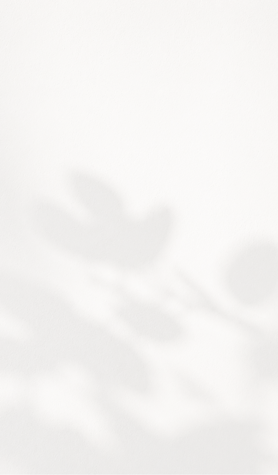 White ethereal smoke wisps dispersing against light background creating abstract atmospheric pattern